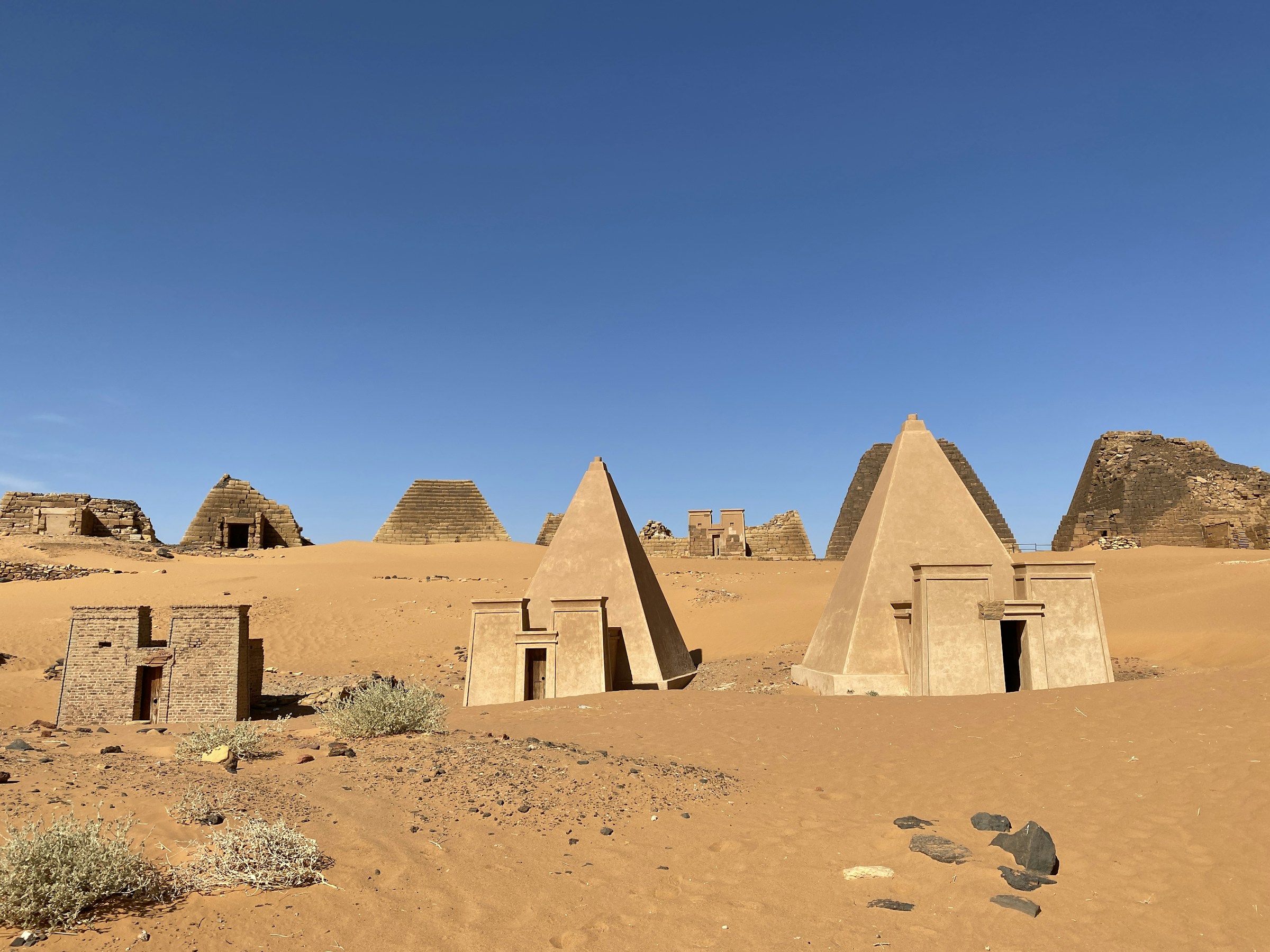 The steep, closely set royal pyramids of Meroë standing in the Sudanese desert