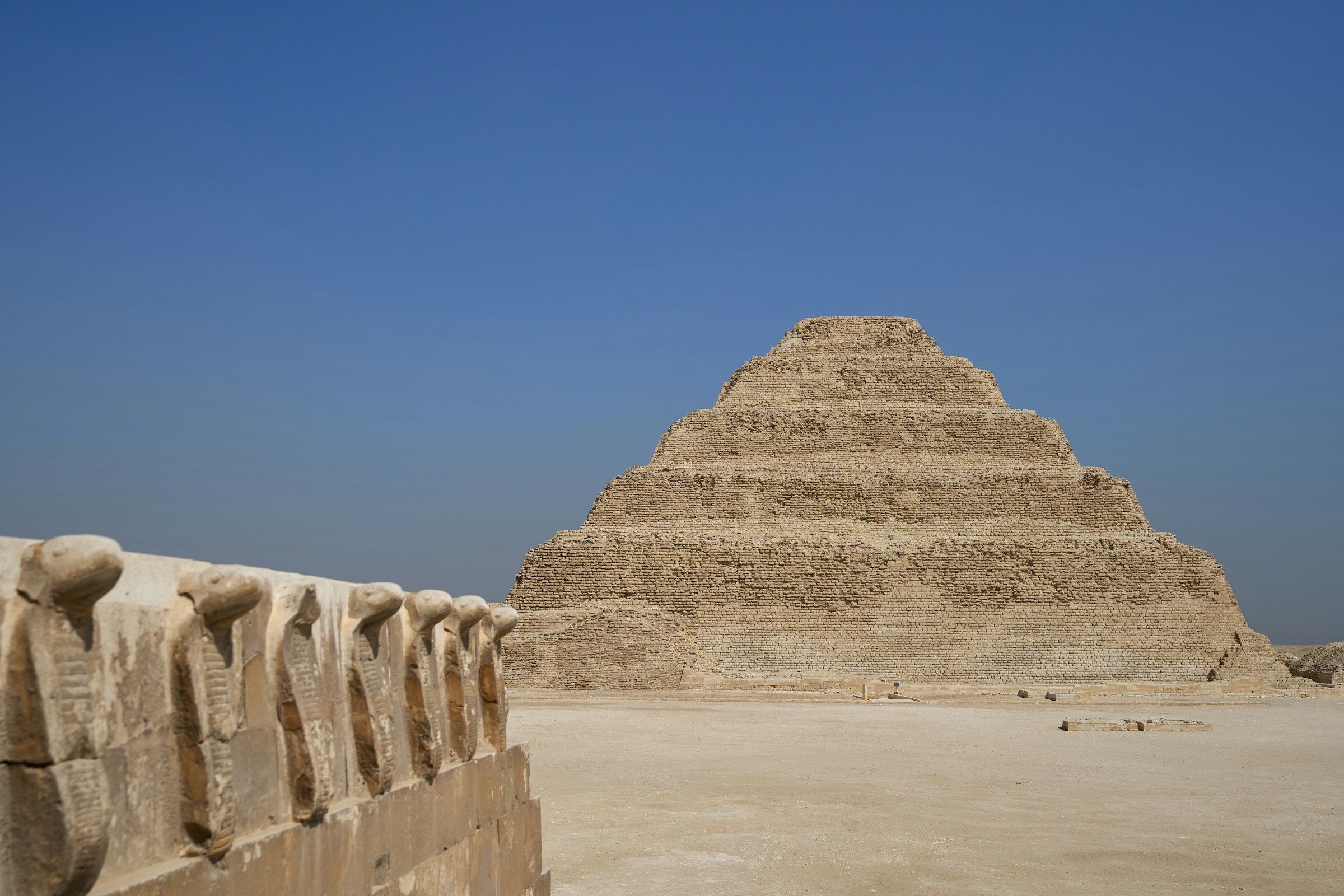 The stepped pyramid of Djoser standing above the desert at Saqqara